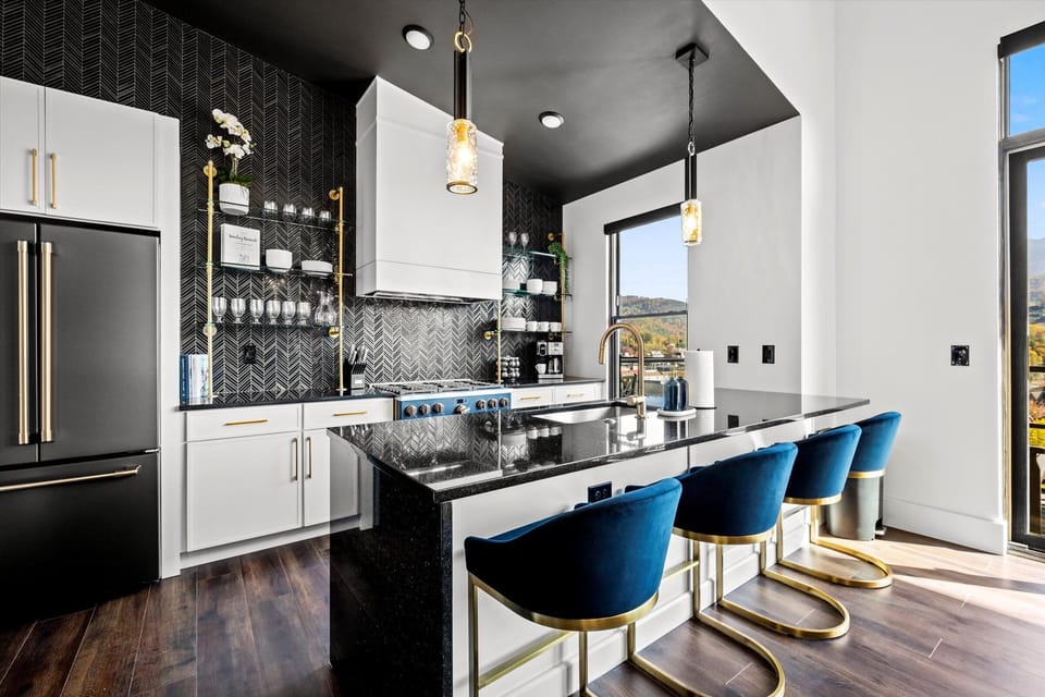 Fully equipped with modern appliances, granite countertops, and all the cookware you need to prepare delicious meals. Gather at the island or dining table for a cozy breakfast or family feast.