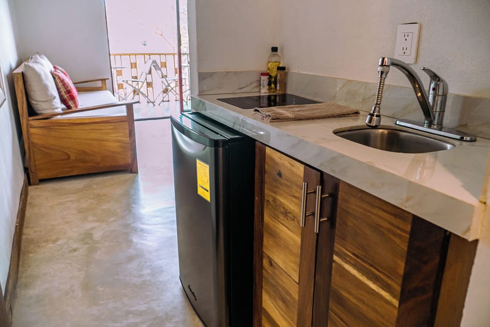 Superior Triple Room, Balcony, Pool View | Private kitchen | Mini-fridge, stovetop, cookware/dishes/utensils