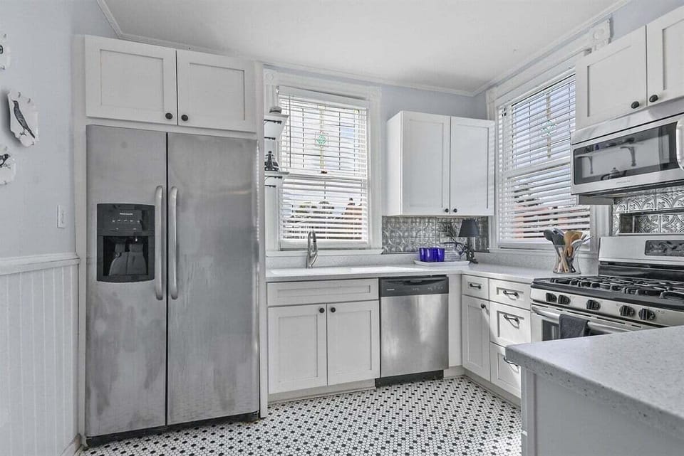 Step into our bright, modern kitchen—a culinary haven where every detail inspires creativity and delicious adventures.