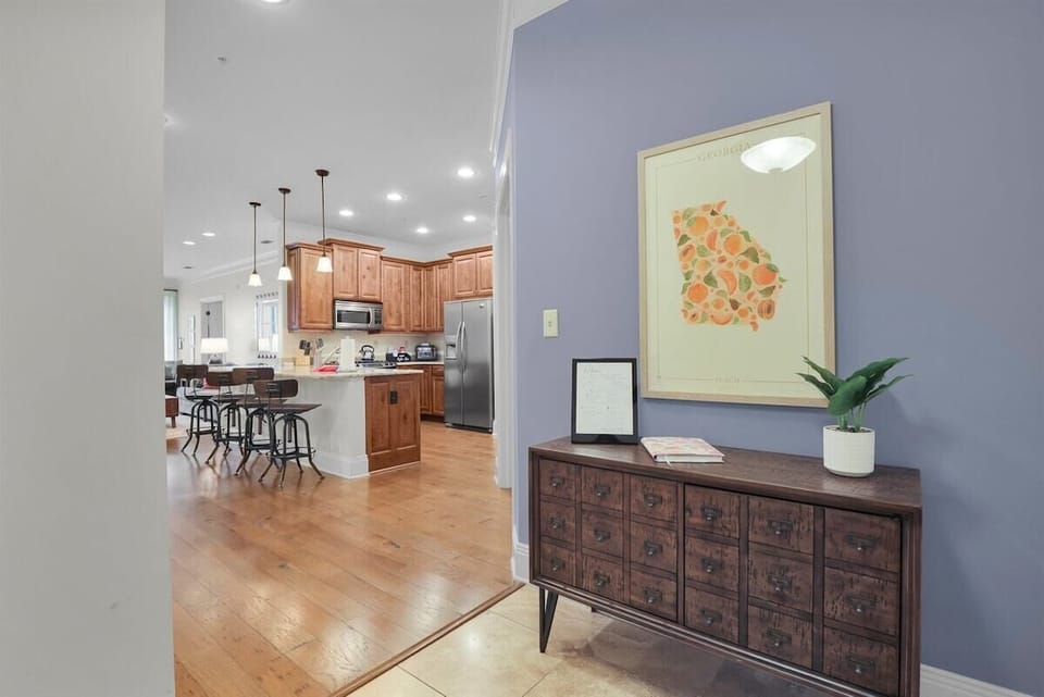 Welcoming entry way leads into an open concept chef's kitchen and living space so you have everything you need at your fingertips.