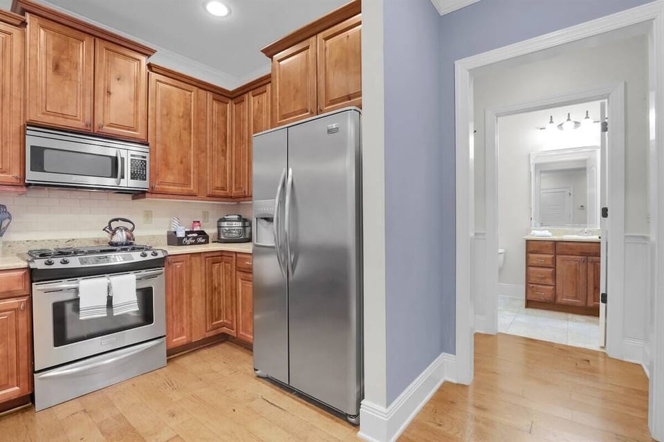 Half bath located directly off the kitchen for a quick touch up before hitting the town.