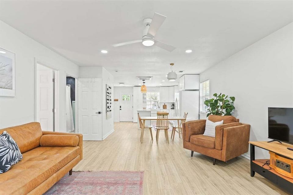 Embrace the laid-back vibes—boho decor in soft neutrals creates a warm, inviting space that feels like home the moment you walk in.