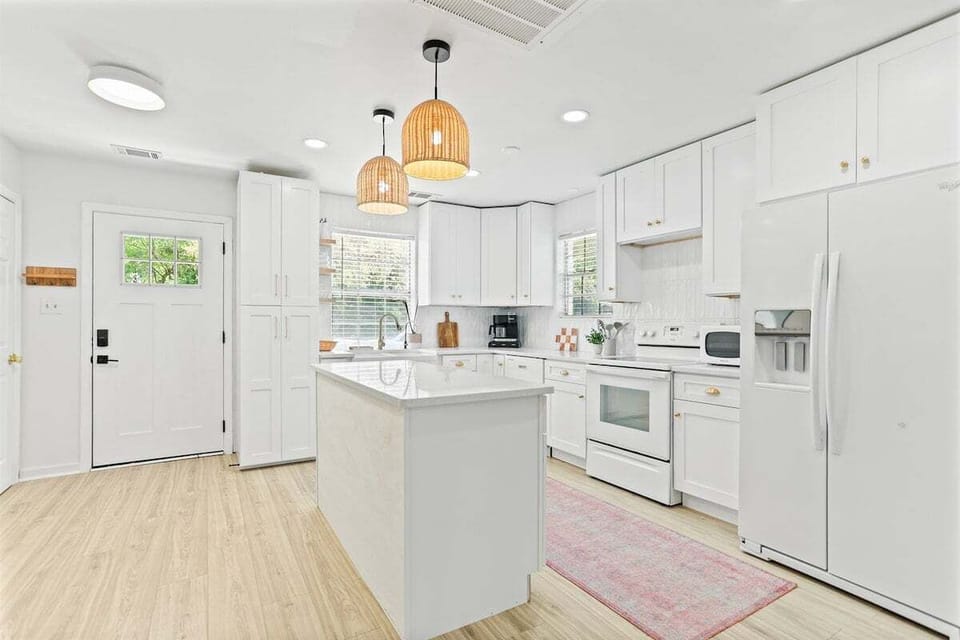 This spacious kitchen is ready for whatever you're cooking up—whether it's a homemade feast or just another round of snacks and wine.