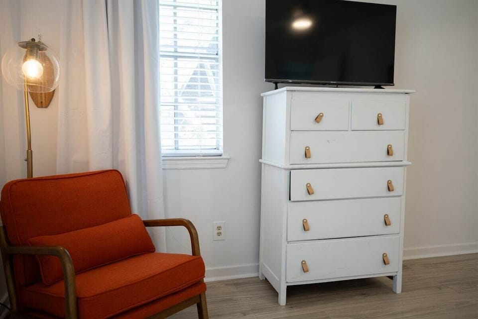 Wind down your day with a favorite show—this primary bedroom comes with its own smart TV for ultimate cozy night-ins.