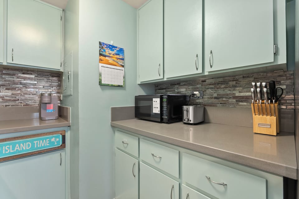 Kitchen includes microwave, toaster, crockpot, rice cooker, air fryer, blender