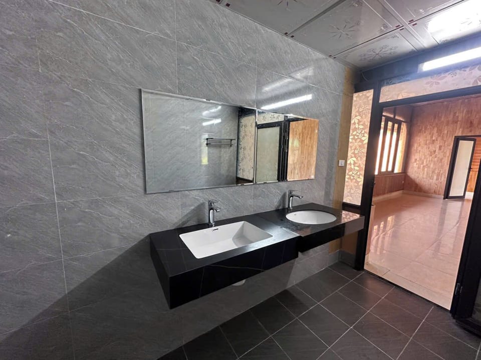 Shower, rainfall showerhead, designer toiletries, hair dryer