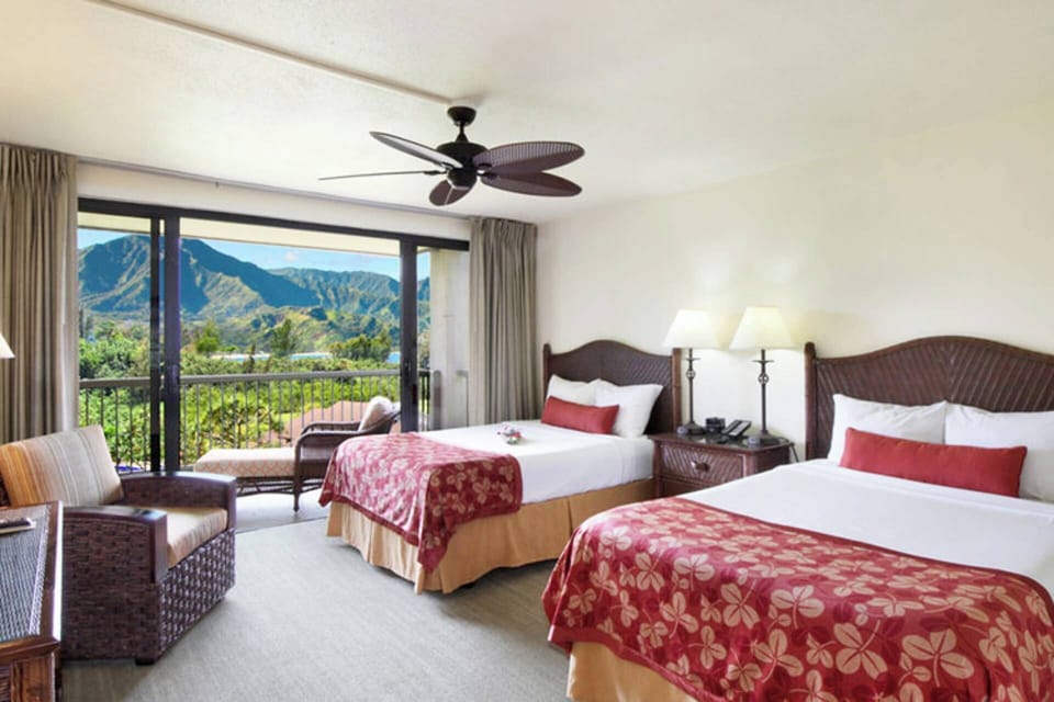 Guest bedroom features two double beds.