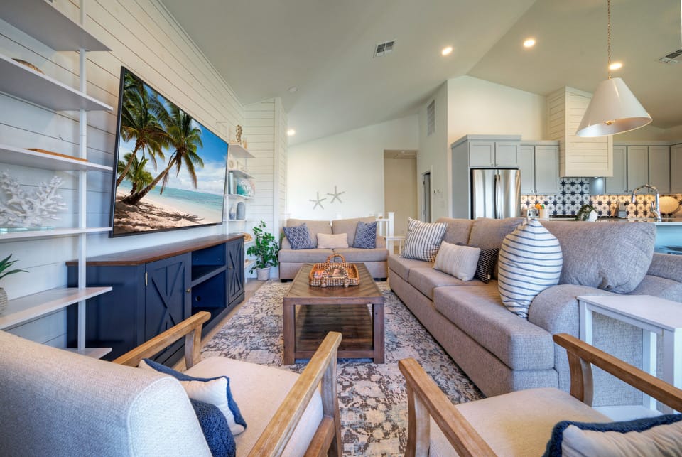 Living room showcasing built-in shelving and designer decor.
