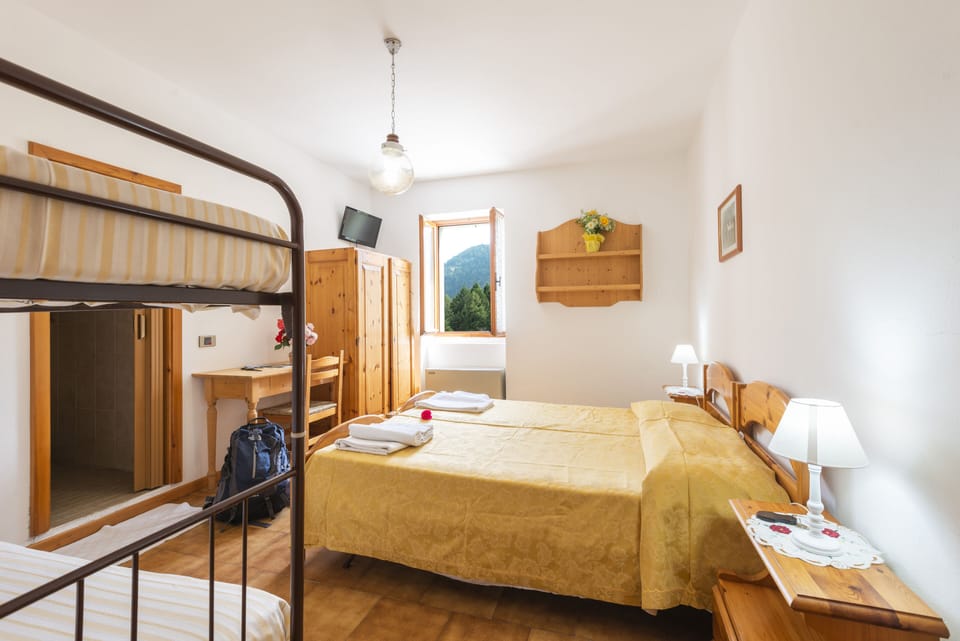 Down comforters, desk, free WiFi, bed sheets