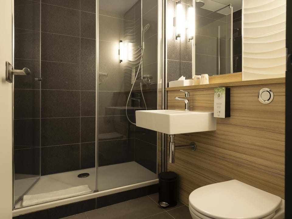 Shower, rainfall showerhead, eco-friendly toiletries, hair dryer