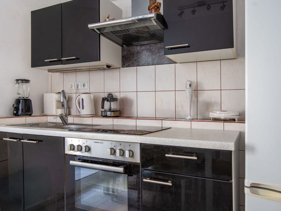 Kitchen Appliance, Kitchen, Countertop, Cabinetry, Major Appliance, Kitchen Stove, Home Appliance, Stove, Interior Design, Furniture
