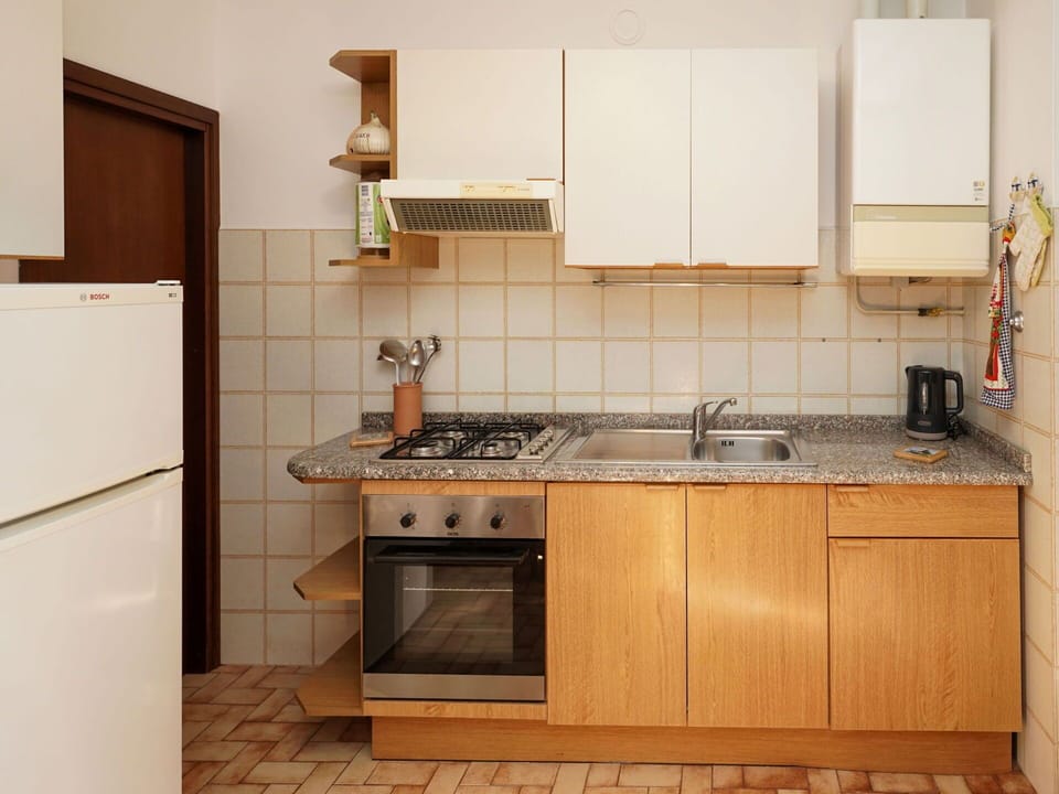 Kitchen Appliance, Kitchen, Countertop, Major Appliance, Cabinetry, Wood, Furniture, Kitchen Sink, Flooring, Interior Design