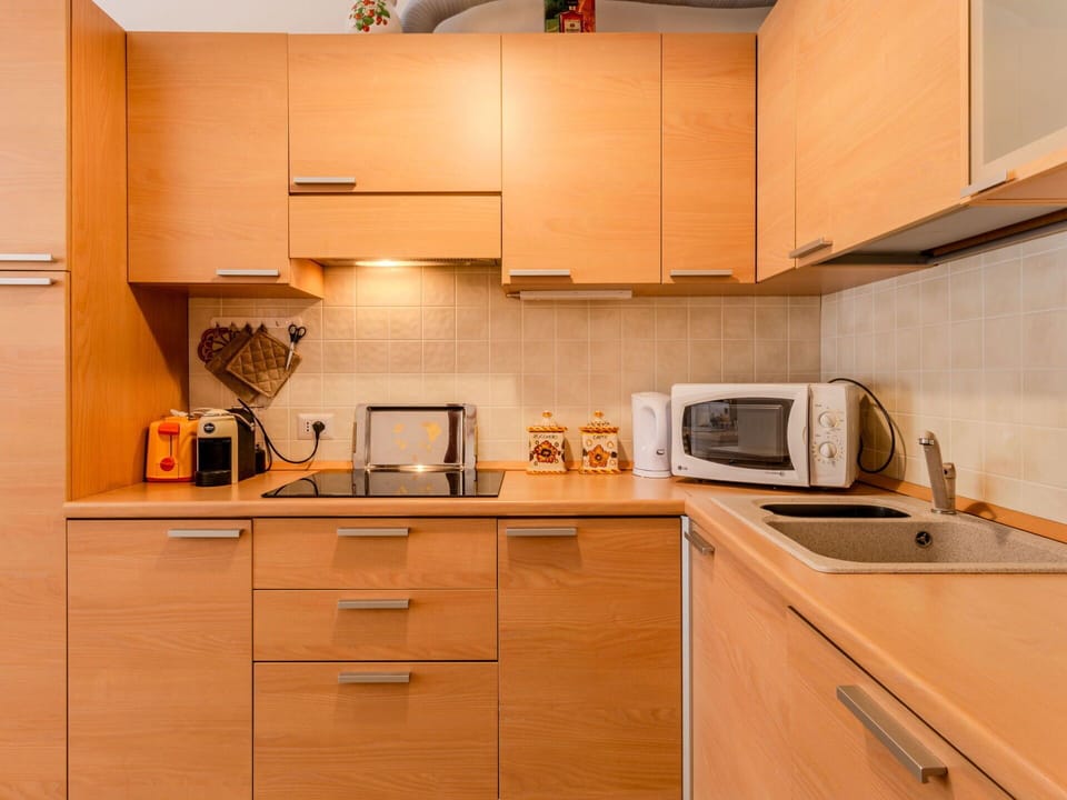 Kitchen, Kitchen Appliance, Countertop, Cabinetry, Major Appliance, Wood, Furniture, Interior Design, Kitchen Sink, Flooring