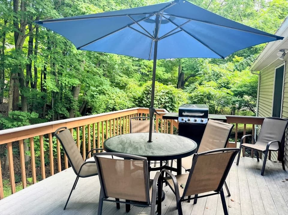Summer Cookouts Taste Better on Summerwood Cottage`s Backyard Deck
