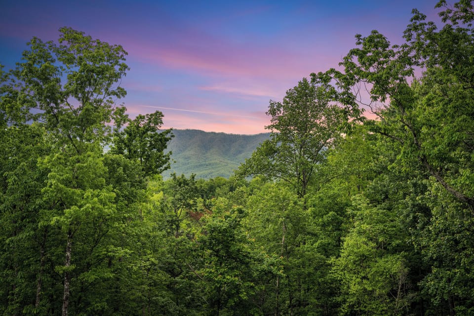 Relax on the deck with seating and Smoky Mountain views