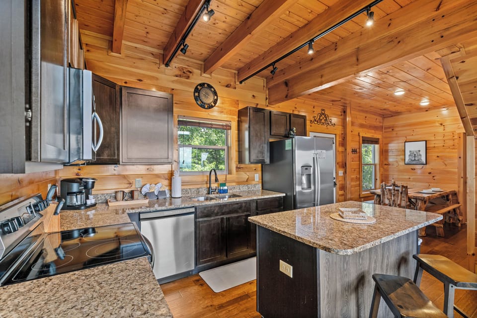 Fully equipped kitchen with granite & stainless steel