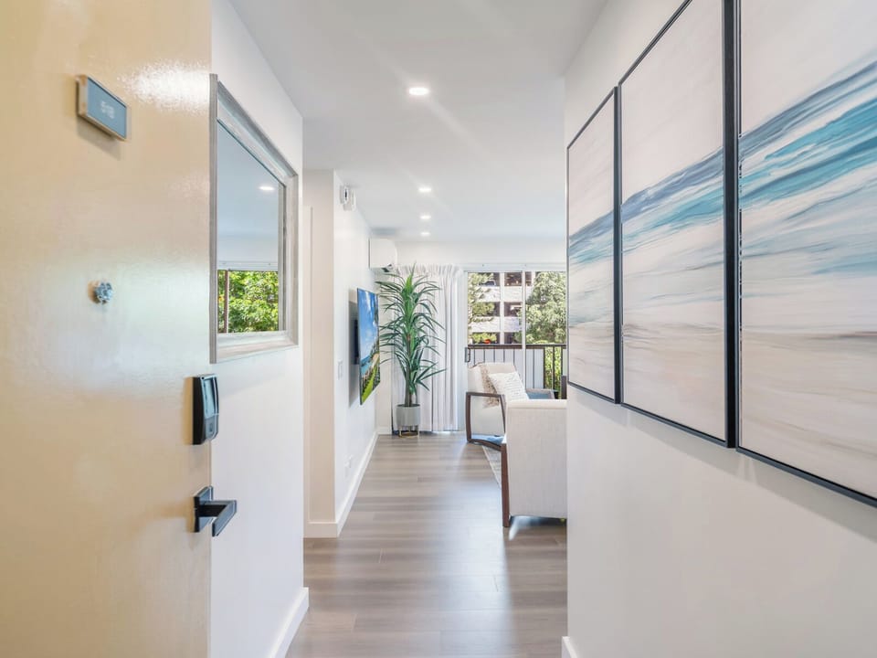 Entryway - Step inside to a clean, light-filled entry that opens straight into the gathering spaces—an inviting start to your at Kuhio at Waikiki.