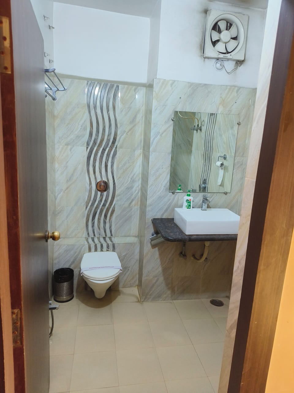 Shower, towels, soap, toilet paper