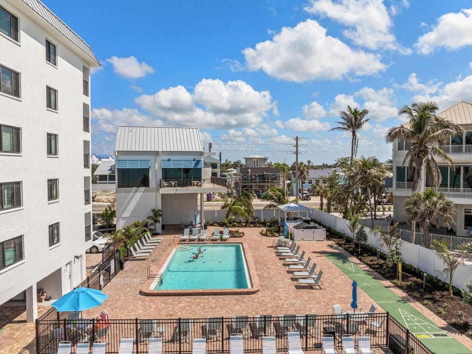Seaside Resort Beachfront Community Pool + Loungers