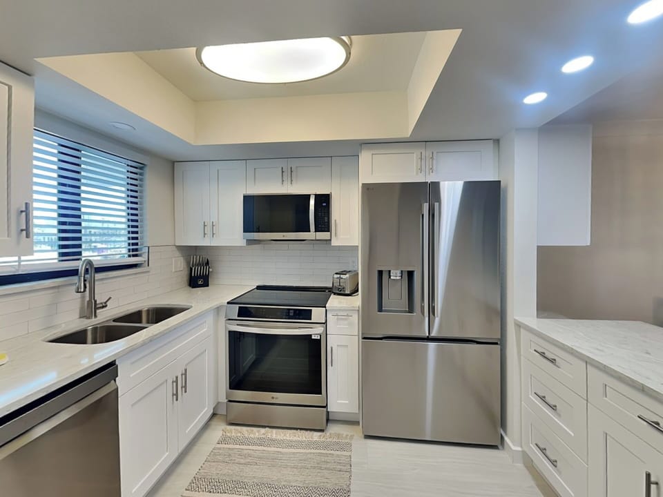Fully Equipped Kitchen with Stainless Steel Appliances