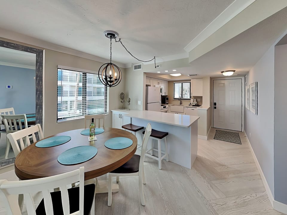 Dining Area with Seating for Four + Breakfast Bar with Seating for Two