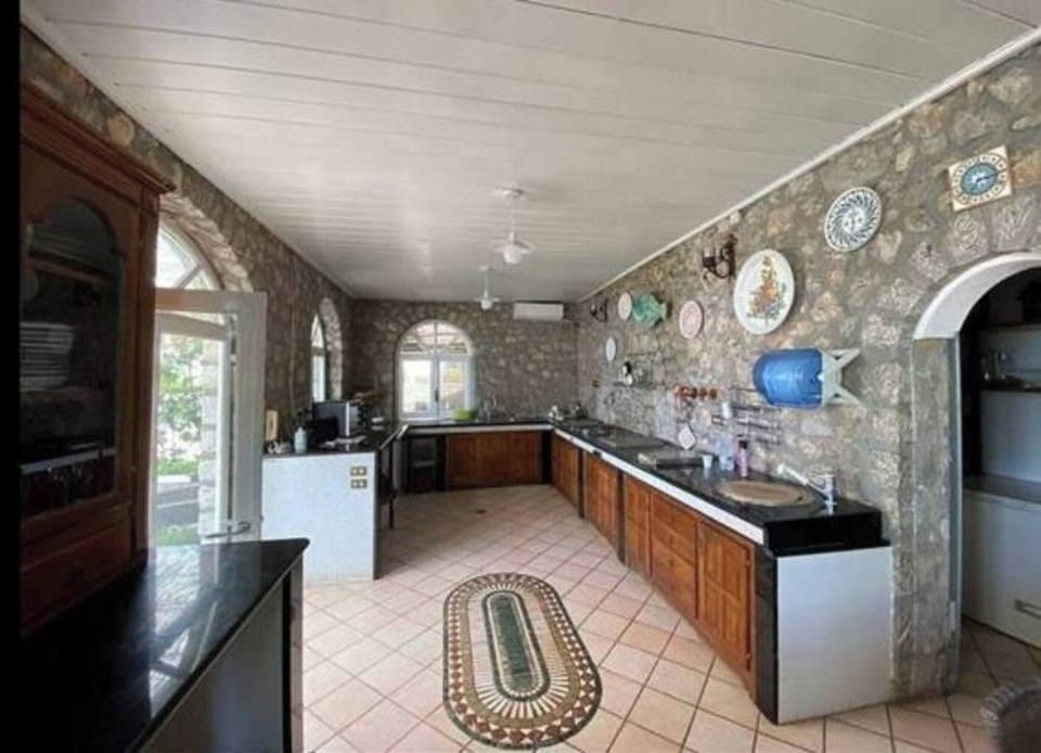 Deluxe Villa, Private Pool, Sea View | Private kitchen | Fridge, microwave, oven, stovetop