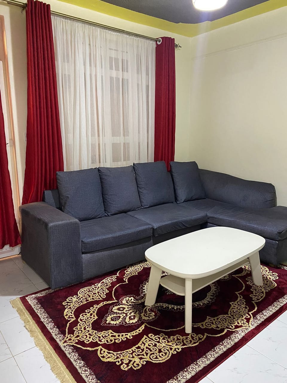 Classic Apartment, City View | Living area | 32-inch Smart TV with digital channels