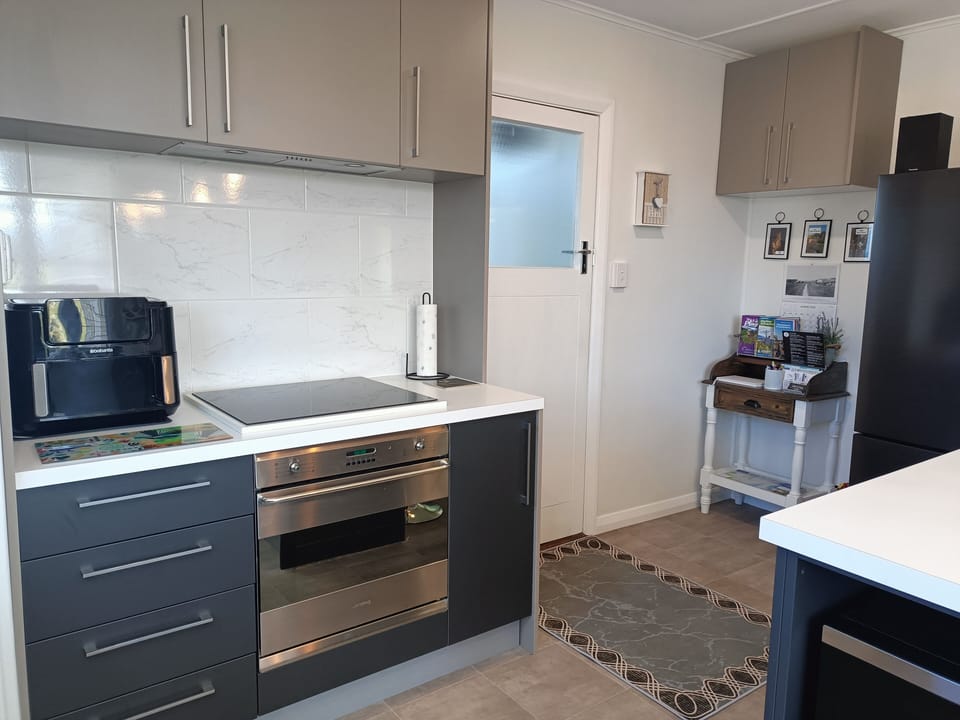 view of kitchen&Guest Information Desk & kitchen cooking amenities 