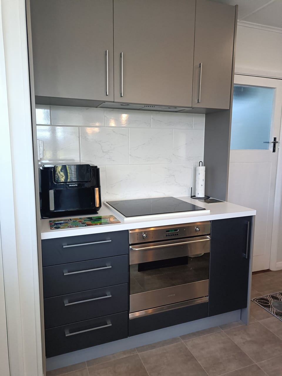 Full sized oven  , air fryer, microwave, fridge/ freezer available.
