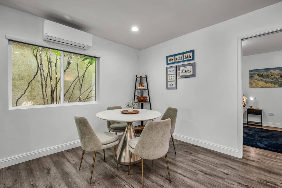 Great work space or gather around our dining table for 4 in this bright and airy space!