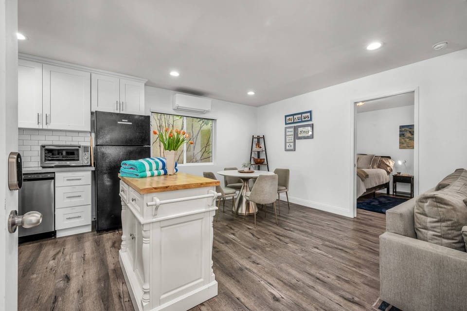 A bright and open kitchen and living space designed for easy living and connection!