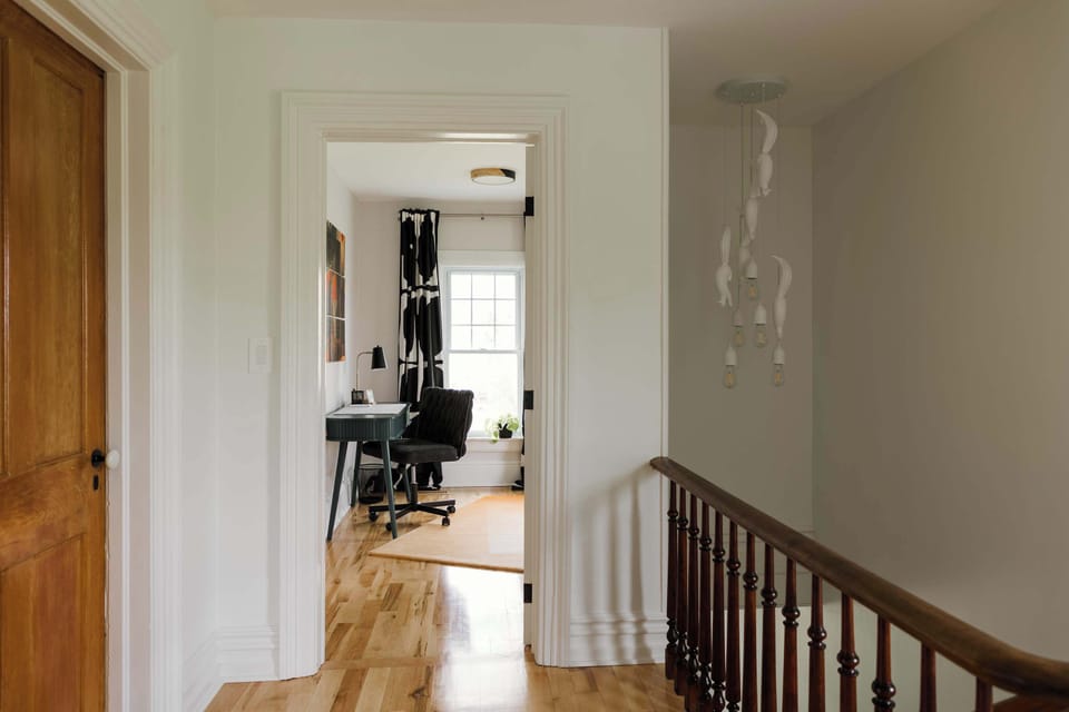 The primary bedroom has an additional room attached to it where we have a desk + a yoga/meditation space.