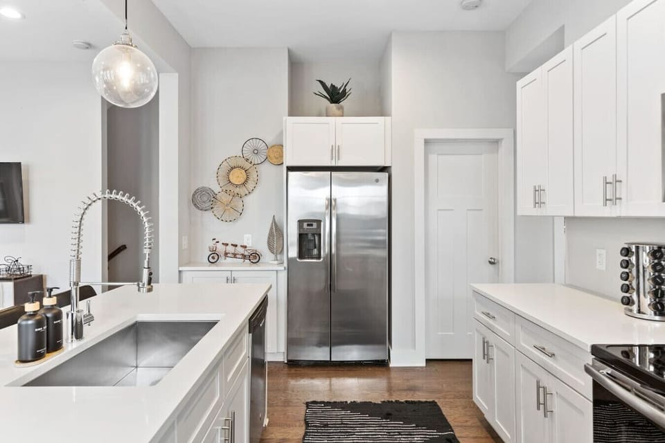 Fully-equipped chef's kitchen with high-end appliances and everything you might need to enjoy a meal at home.