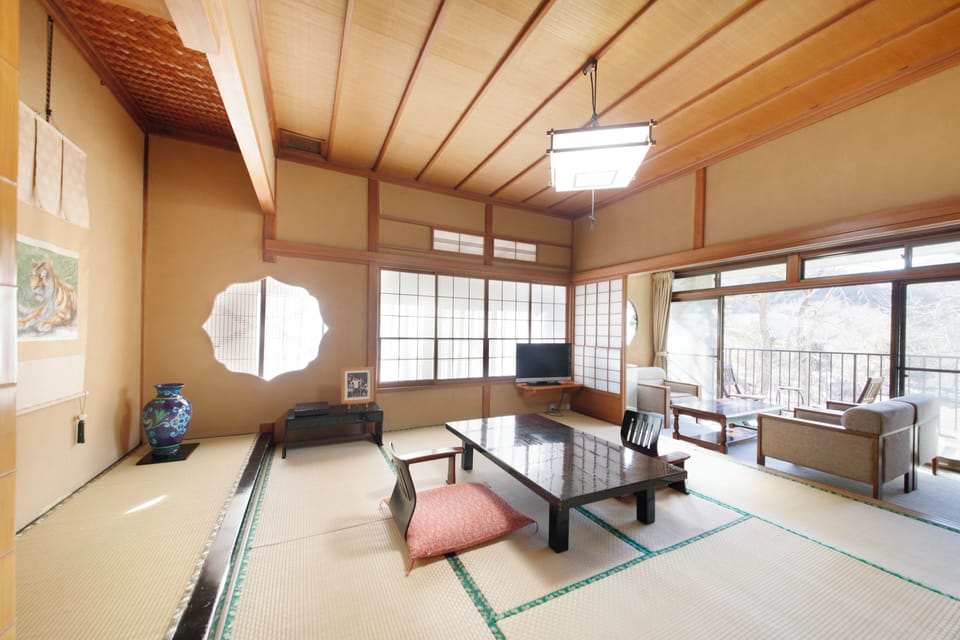 Suite, Garden View | In-room safe, desk, iron/ironing board, free WiFi