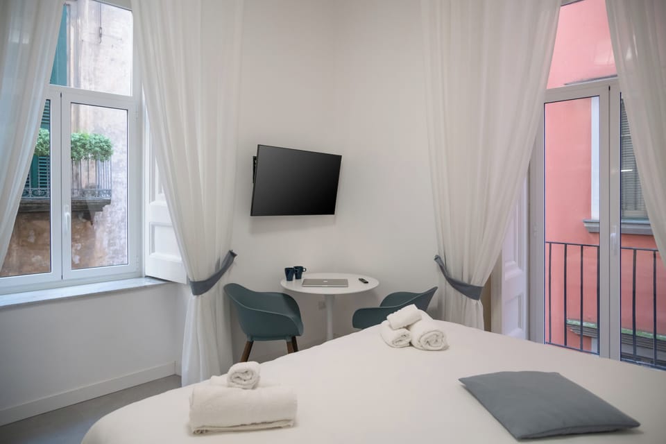 Deluxe Townhome, Balcony | 1 bedroom, desk, laptop workspace, blackout drapes