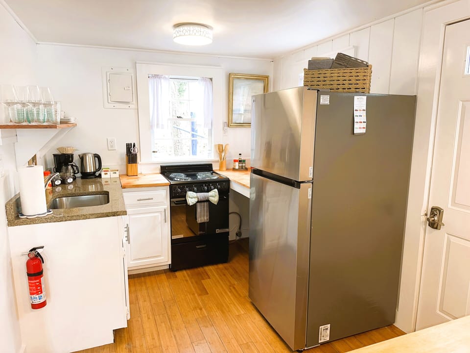 Galley kitchen has everything and new appliances