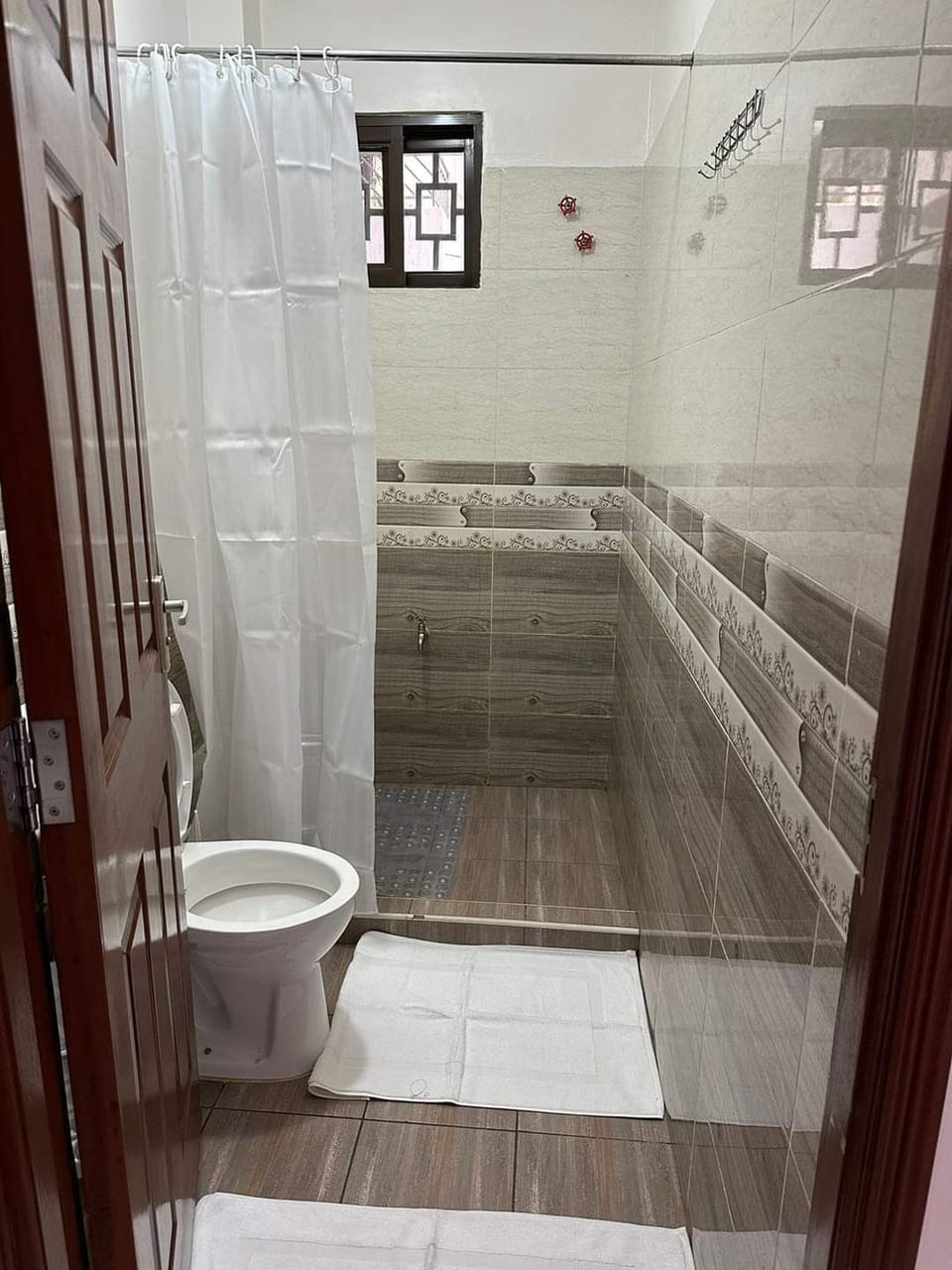 Family Apartment, Balcony, City View | Bathroom | Shower, free toiletries, slippers, towels