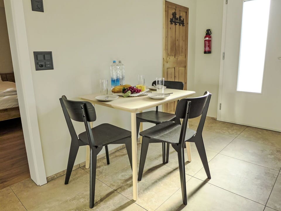 Furniture, Flooring, Wood, Floor, Table, Chair, Interior Design, Kitchen & Dining Room Table, Dining Room, Wood Stain