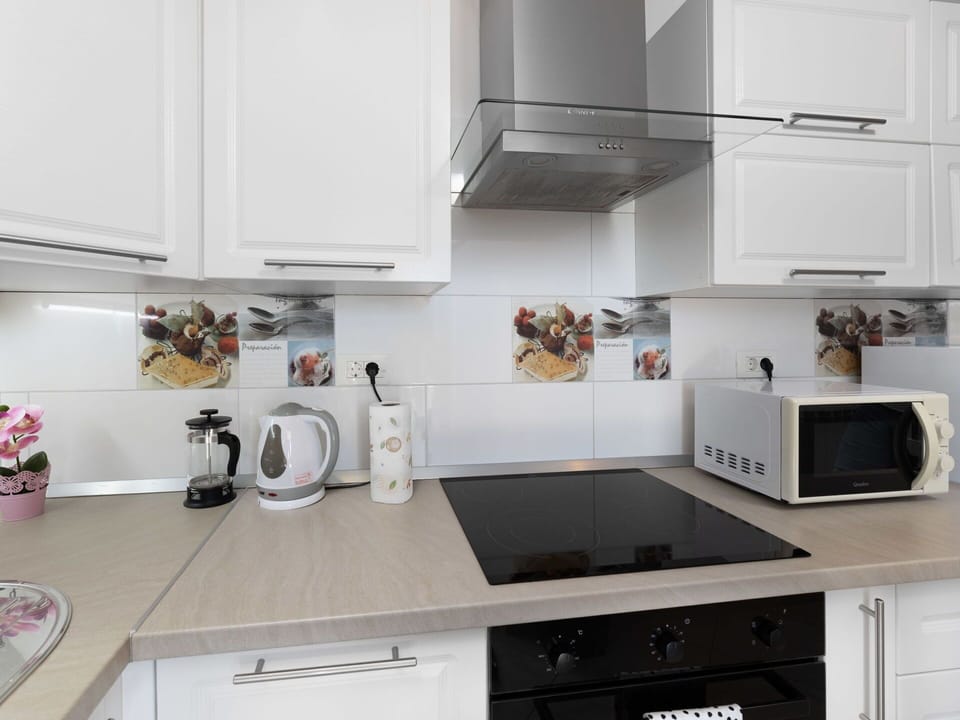 Furniture, Wood, Interior Design, Cabinetry, Kitchen, Flooring, Countertop, Cupboard, Room, Wood Stain