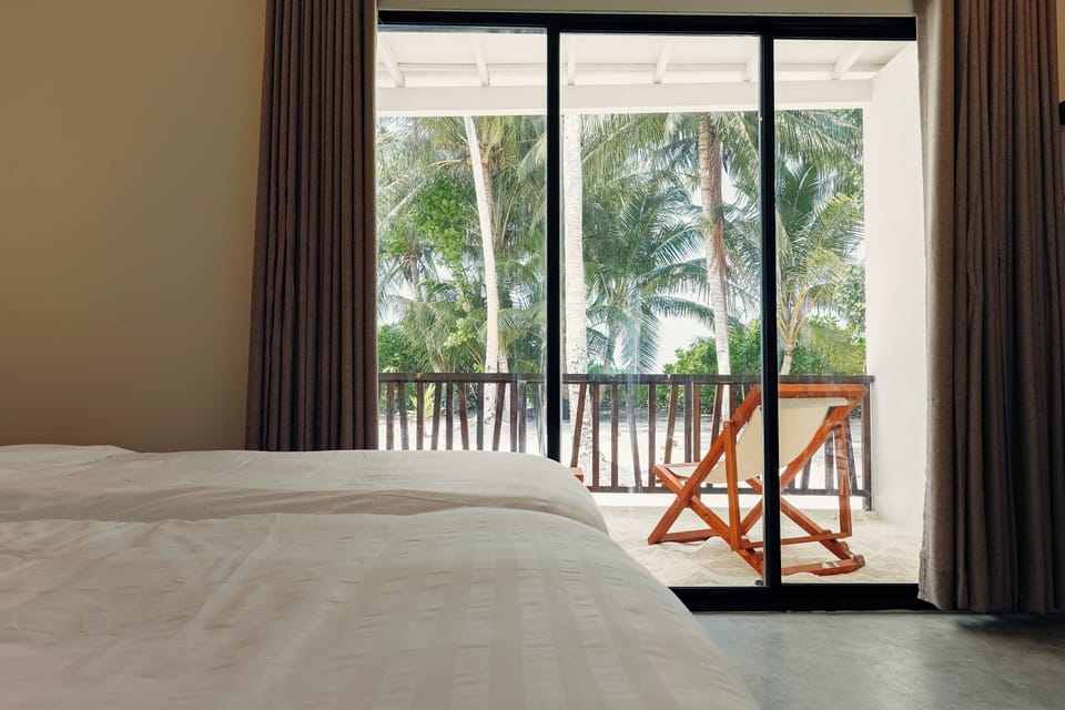 Deluxe Double Room, Sea View | In-room safe, iron/ironing board, free WiFi, bed sheets