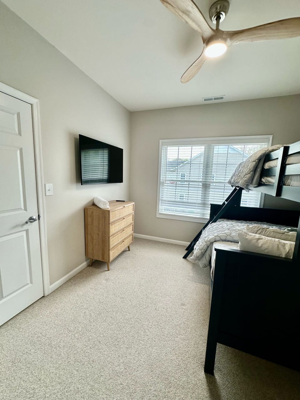 Guest bedroom with Twin-XL over Full bunk bed