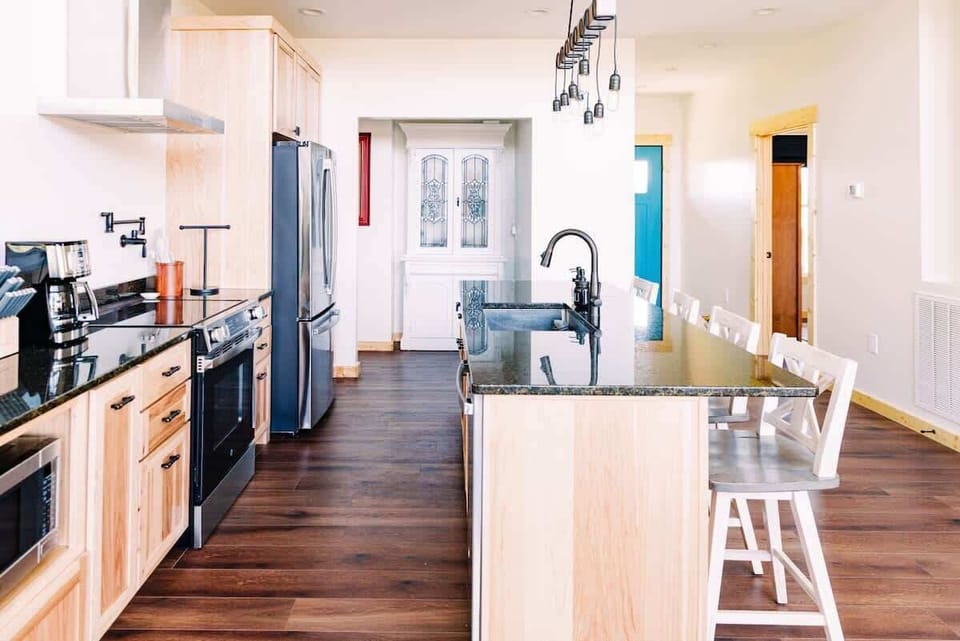 Full kitchen with all you need to prepare a meal.  Refrigerator/Stove/Dishwasher/Microwave