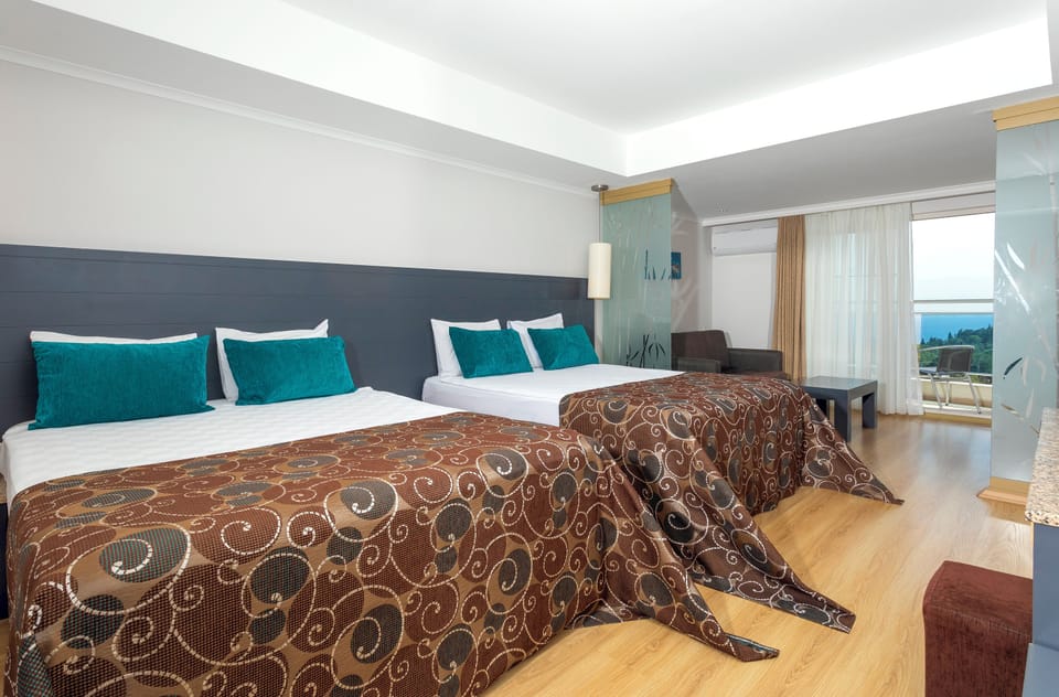 Superior Room, Balcony, Partial Sea View | In-room safe