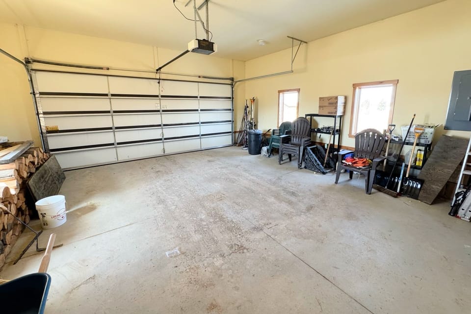 Keep your vehicle and gear dry in this large garage! (Personal items belonging to the homeowners do stay in the garage year-round.)
