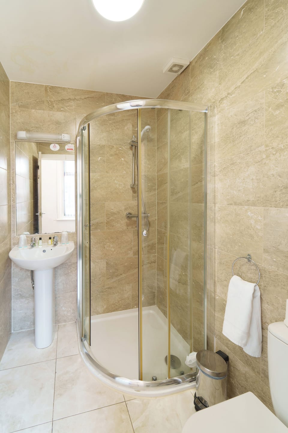 Family Quadruple Room, 1 Double bed and 2 single beds | Bathroom | Shower, free toiletries, hair dryer, towels