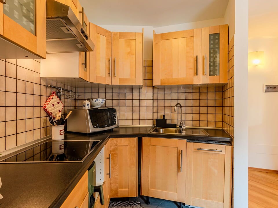 Kitchen, Countertop, Kitchen Appliance, Interior Design, Wood, Major Appliance, Flooring, Cabinetry, Furniture, Floor