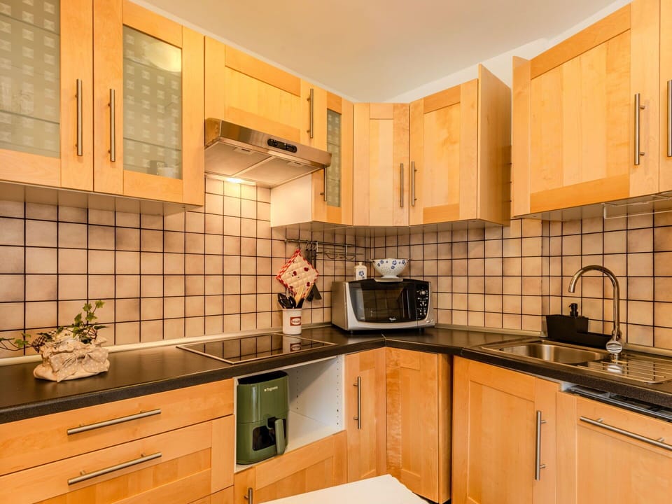 Kitchen, Countertop, Kitchen Appliance, Cabinetry, Wood, Major Appliance, Interior Design, Flooring, Sink, Plumbing Fixture