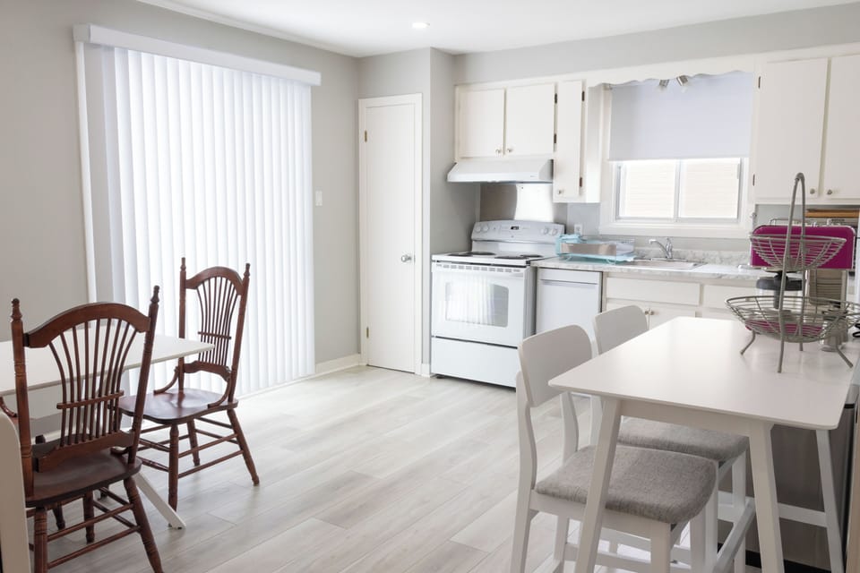 A charming kitchen, equipped for culinary adventures with modern appliances.