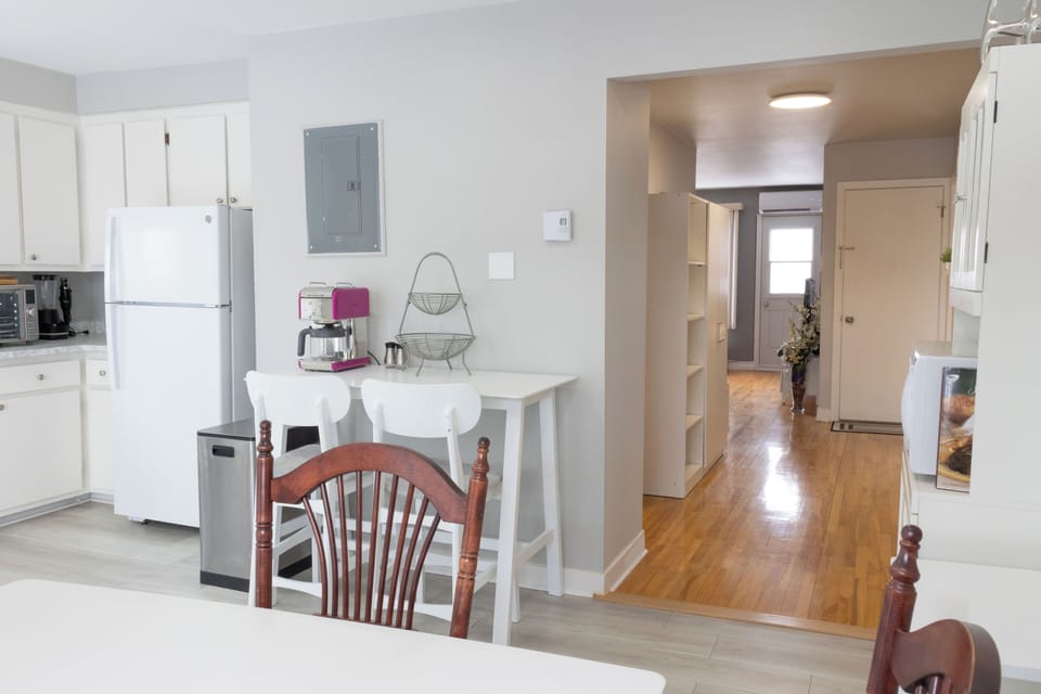 A charming kitchen, equipped for culinary adventures with modern appliances.
