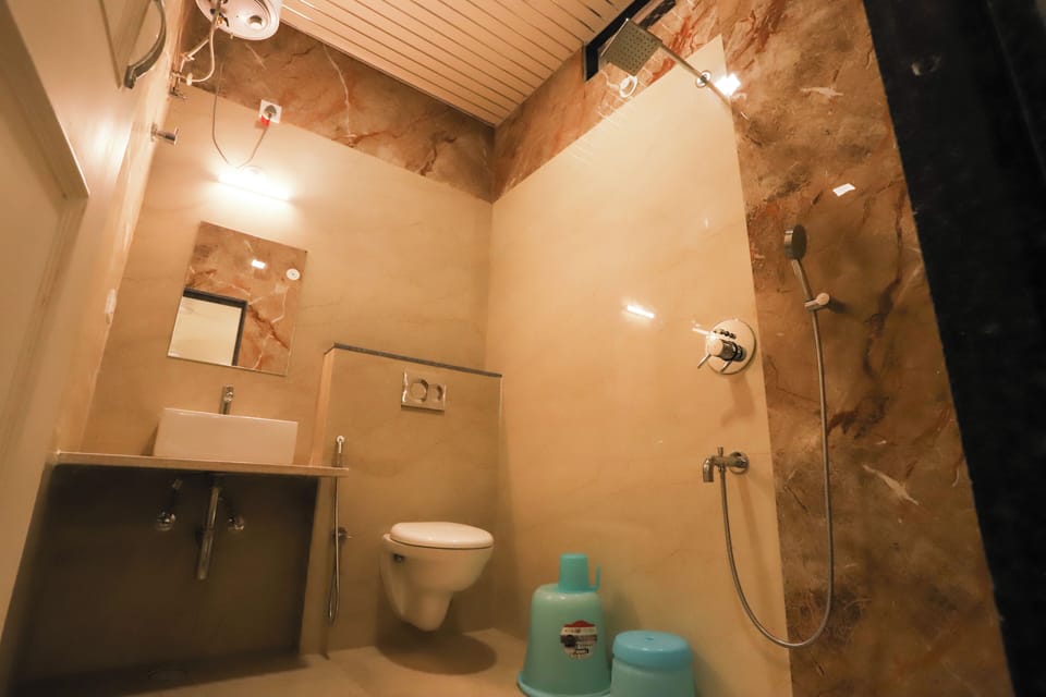 Triple Room | Bathroom | Shower, slippers, towels, soap